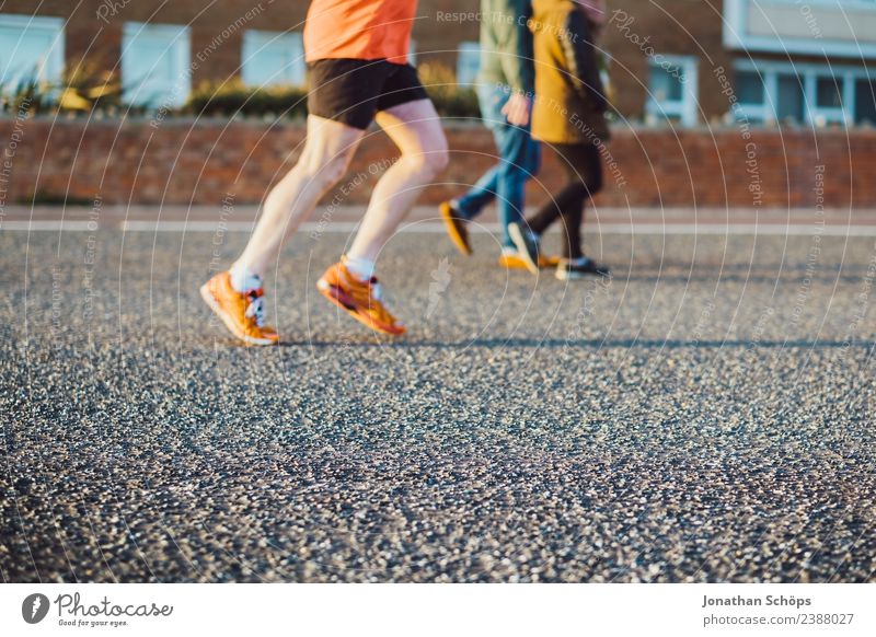 Jogger in the evening sun Lifestyle Leisure and hobbies Human being Masculine Man Adults Body 1 3 Enthusiasm Optimism Success Power Willpower Brave Brighton