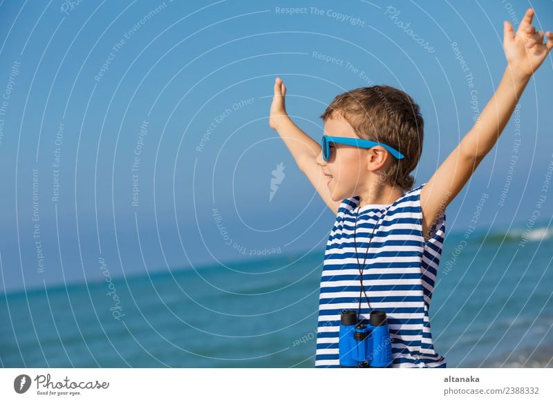 One happy little boy playing on the beach Lifestyle Joy Happy Beautiful Relaxation Leisure and hobbies Playing Vacation & Travel Trip Adventure Freedom Summer