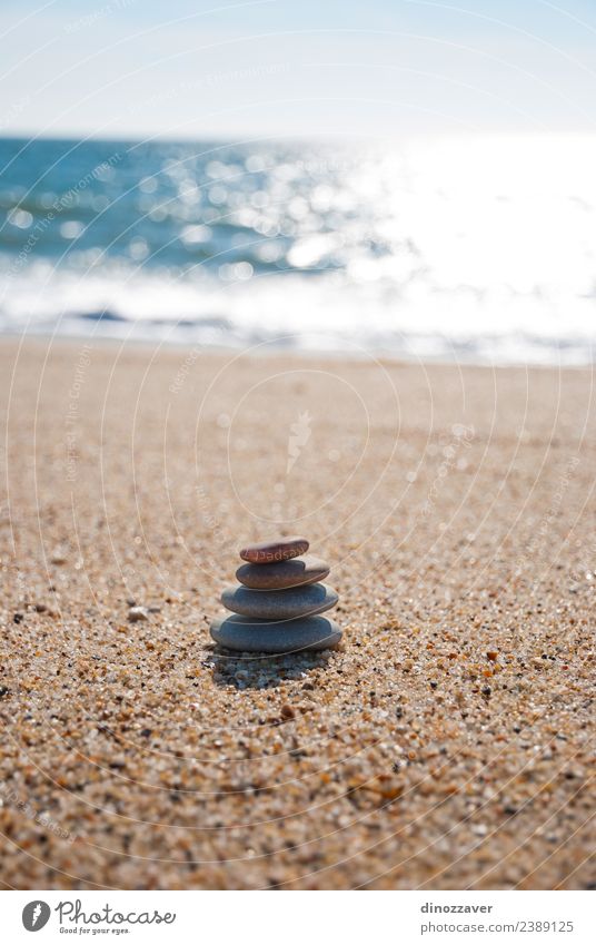 Stones stack on the sand Wellness Harmonious Relaxation Meditation Spa Summer Beach Ocean Nature Sky Horizon Rock Coast Natural Blue Black White Colour