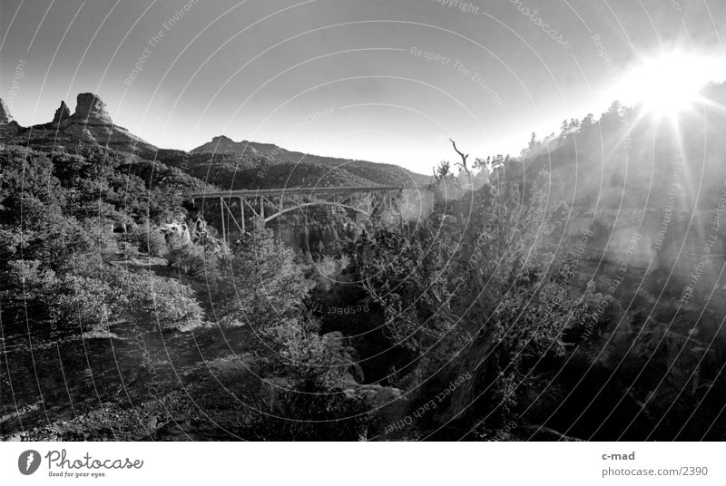 Bridge near Sedona Back-light Steel bridge Sun Sunlight Sunbeam Black & white photo Dazzle Luminosity Valley Landscape