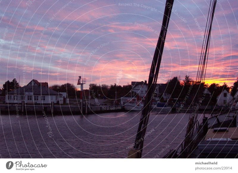 port atmosphere Vitte Hiddensee Clouds Watercraft Ocean Shrouds Fishing boat Fisherman Europe sunset Harbour