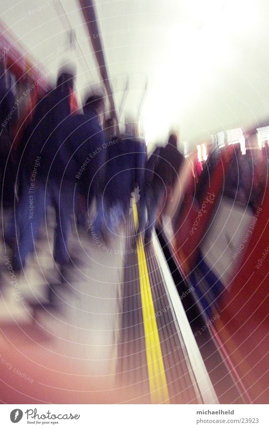 London Underground 4 Platform Neon light Light In transit Get in Stop Transport arriving train Human being Passenger