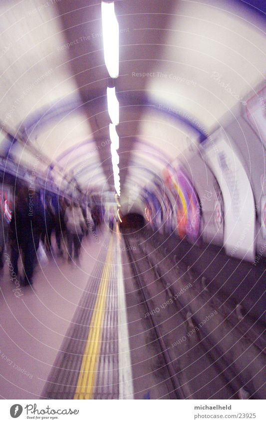 London Underground 2 Platform Neon light Light Railroad tracks Round Transport Blur Public transit Central perspective Tunnel vision Tunnel lighting