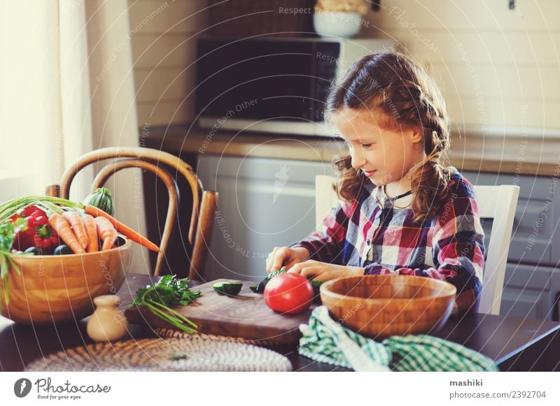 child girl help mom to cook Vegetable Lunch Dinner Lifestyle Joy Happy Table Kitchen Child Mother Adults Family & Relations Growth Fresh Small Salad knife Cut