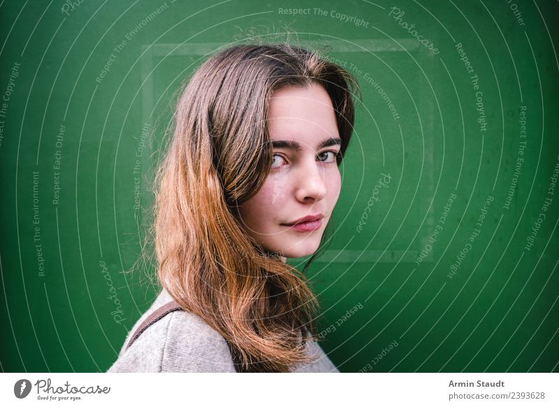 Portrait in front of a green wall Lifestyle Style Beautiful Well-being Contentment Senses Relaxation Calm Meditation Trip Summer Human being Feminine