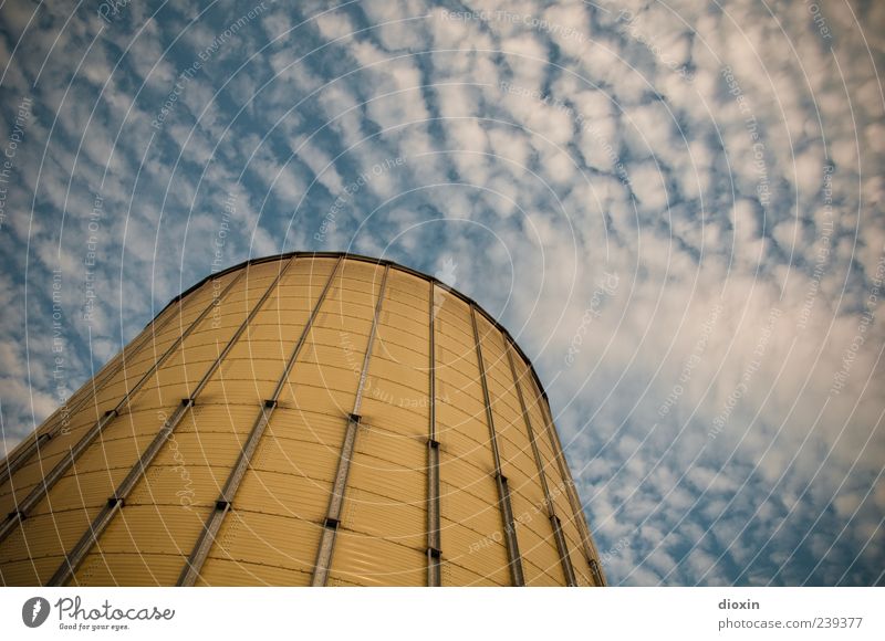 silo Sky Clouds Mannheim Germany Outskirts Deserted Industrial plant Harbour Manmade structures Silo Grain silo Barn Metal Gigantic Large Tall Blue Yellow White