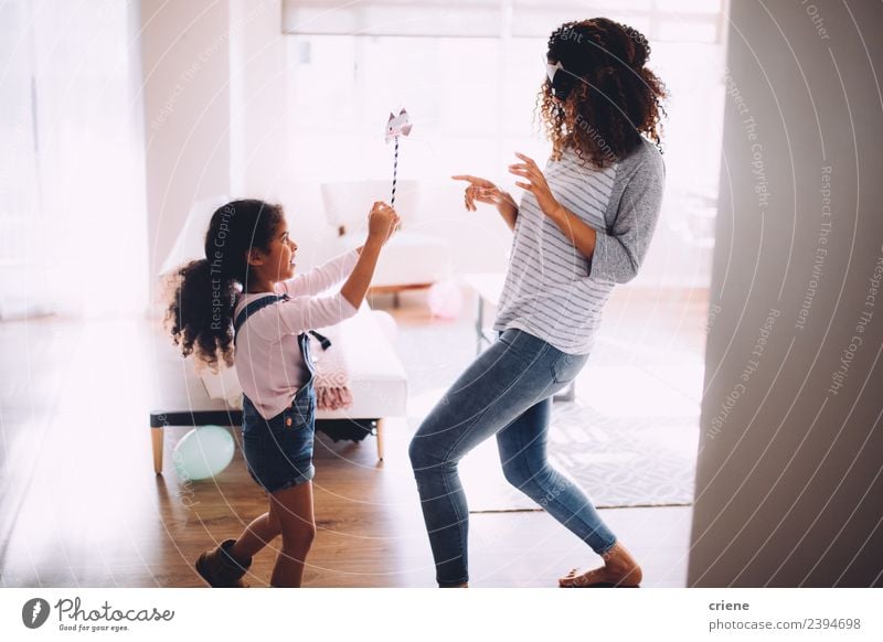 mother and daughter having fun with cat costume Joy Happy Playing Child Parents Adults Mother Family & Relations Infancy Laughter Happiness Together Small Funny