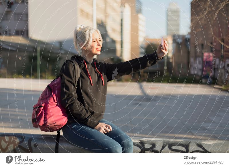 Young woman is taking selfie after school. Lifestyle Style Joy Happy Relaxation Mountain School Schoolchild Student Telephone Cellphone PDA Camera Human being