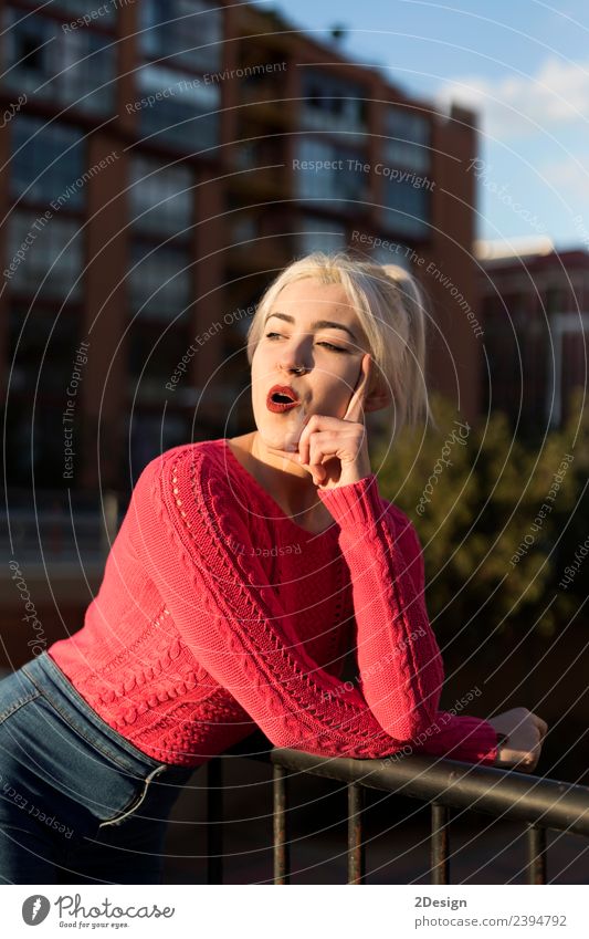 Portrait of a young blonde woman gesturing Happy Beautiful Face Human being Feminine Young woman Youth (Young adults) Woman Adults Arm 1 13 - 18 years