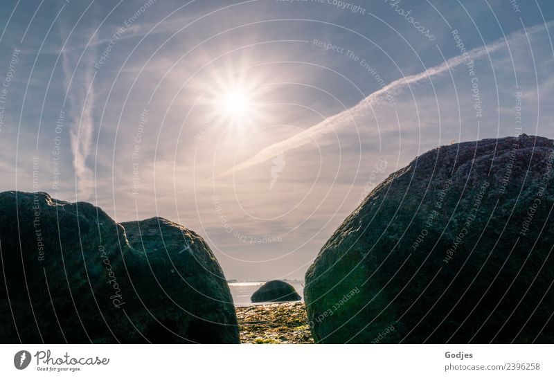 View between rocks to rock in water and sun star in blue sky Nature Water Sky Clouds Horizon Sun Sunlight Spring Beautiful weather Beach Breathe Authentic Blue