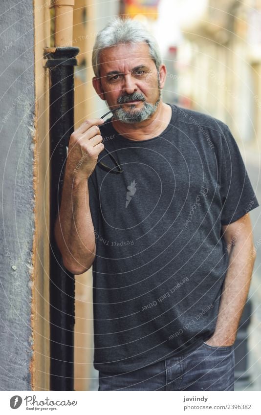 Mature man looking at camera in urban background. Lifestyle Happy Human being Masculine Man Adults Male senior Senior citizen 1 45 - 60 years 60 years and older