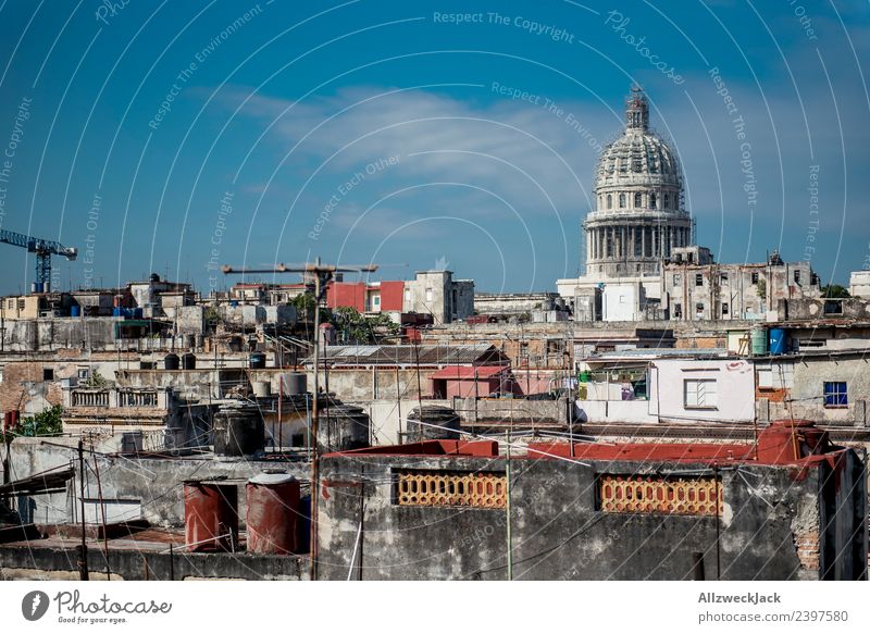 View over Havana Vieja to Capitol Cuba United States Capitol Skyline Vantage point Apartment Building Tower block Tumbledown Construction site Blue sky