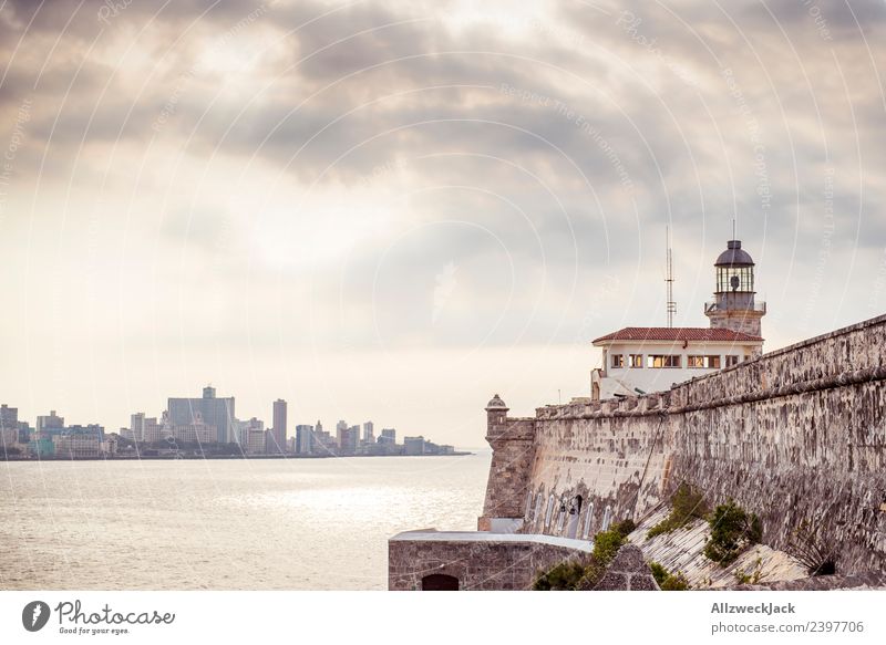 View over the sea to the Malecón of Havana Cuba Island Socialism Vacation & Travel Travel photography Trip Sightseeing Twilight Clouds Covered Lighthouse