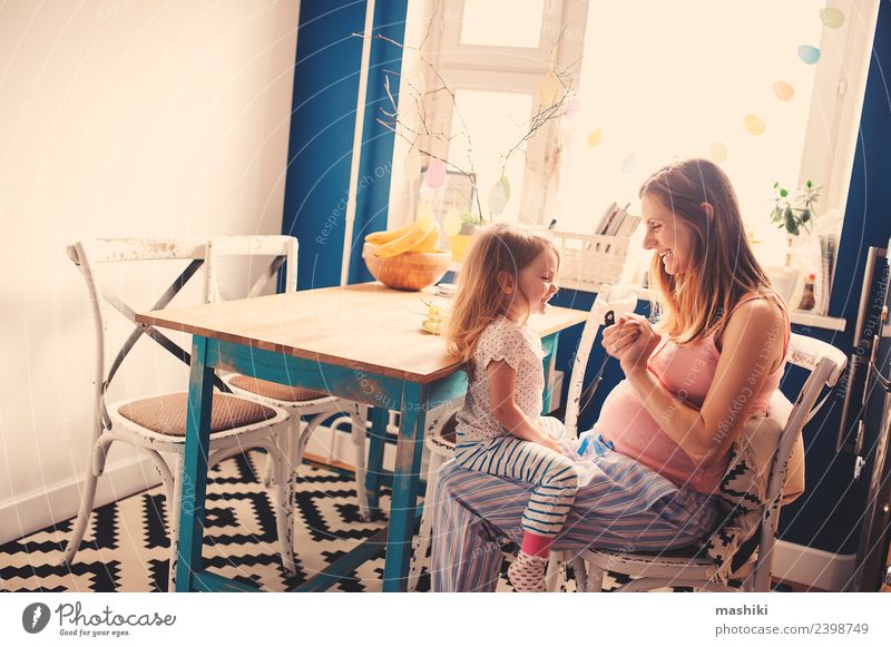 happy family having breakfast at home Breakfast Tea Happy Beautiful Kitchen Child Baby Toddler Parents Adults Mother Sister Family & Relations Friendship