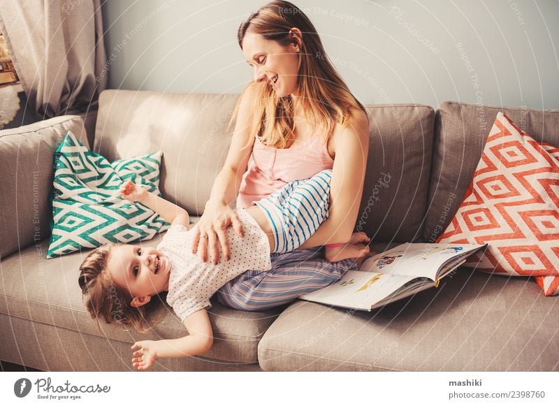 happy toddler girl playing with mother at home Lifestyle Joy Happy Beautiful Playing Sofa Child Baby Toddler Woman Adults Parents Mother Family & Relations