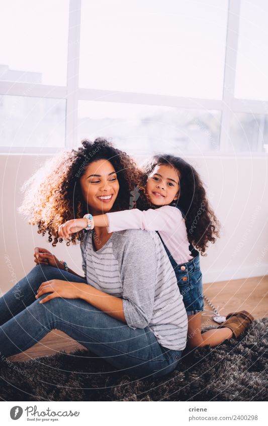 african daughter hugging her mom at home Happy Beautiful Life House (Residential Structure) Child Woman Adults Parents Mother Family & Relations Infancy Smiling