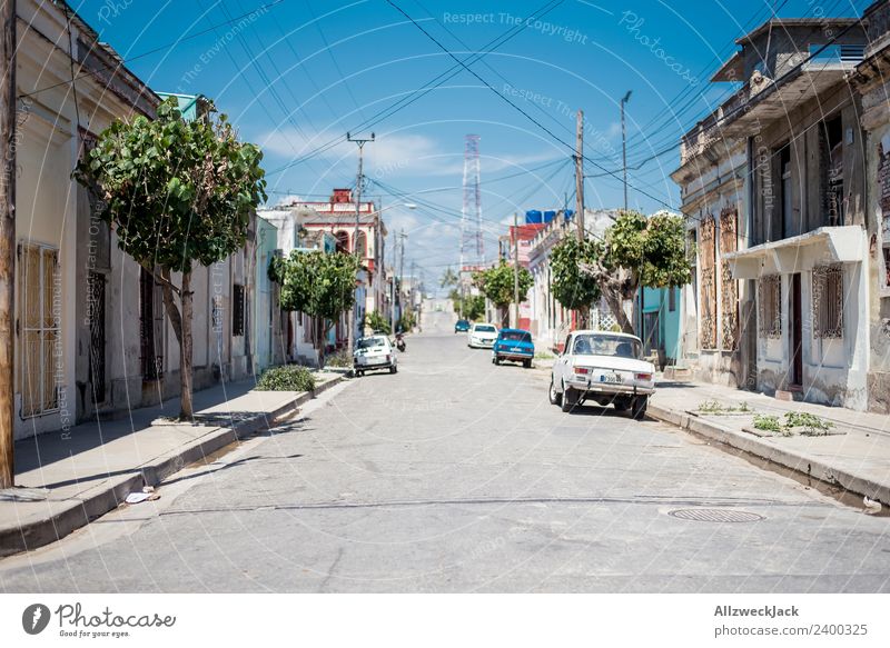 Midday sun on the streets of Cienfuegos Cuba Vacation & Travel Travel photography Street Town Deserted Vintage car Parking Car Summer Blue sky Hot Gloomy