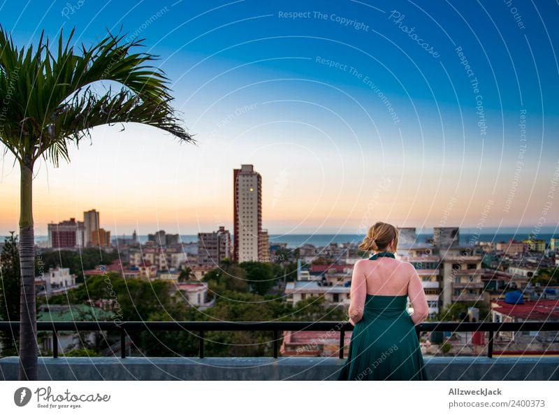 Woman on terrace with view over Havana in Cuba Panorama (View) Sunset Summer Card Vacation & Travel Dusk Vantage point Skyline Palm tree Island