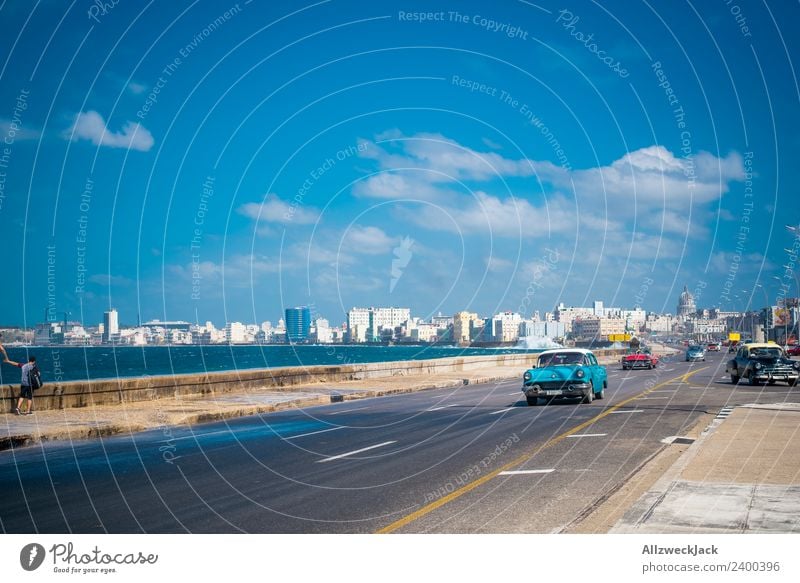 Oldtimer at the Malecon in Havana Day Summer Blue sky Cuba El Malecón Ocean Water Vintage car Car Time travel Promenade Coast Skyline Clouds Vacation & Travel