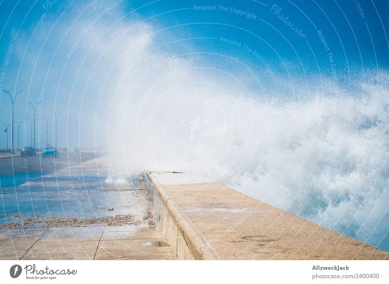 Spray at the Malecon in Havana Day Summer Blue sky Cuba El Malecón Ocean Water Waves White crest Promenade Coast Skyline Clouds Vacation & Travel