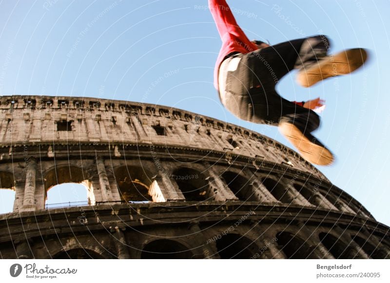 city hopping Leisure and hobbies Young man Youth (Young adults) Legs Feet 1 Human being Tourist Attraction Landmark Colosseum Movement Jump Italy Rome