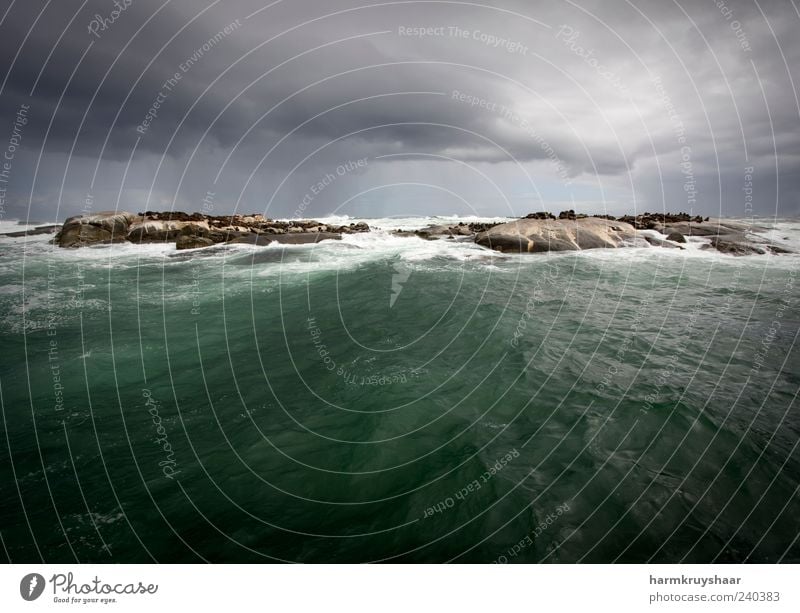 Dramatic stormy weather on the ocean with an island Environment Nature Landscape Clouds Storm clouds Bad weather Wind Gale Rain Thunder and lightning