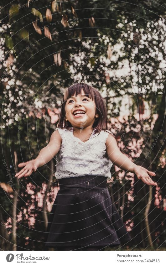 Little cute short-haired girl throws leaves Lifestyle Style Joy Happy Beautiful Playing Child Hand Nature Autumn Leaf Park Forest Dress Hat Blonde Laughter