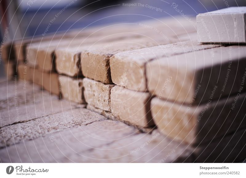 stacking stones Deserted Work and employment Dusty Stone Paving stone Stack Construction site Dirty Depth of field Blue Close-up Detail Subdued colour Evening