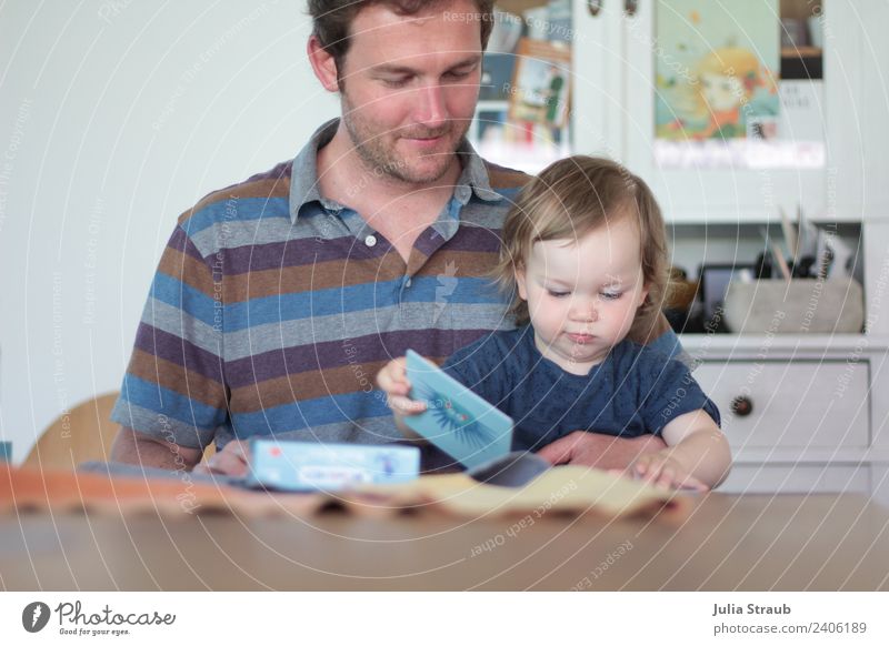 Toddler playing memory with her daddy Masculine Feminine Man Adults Father Family & Relations 2 Human being 1 - 3 years 30 - 45 years T-shirt Brunette Sit