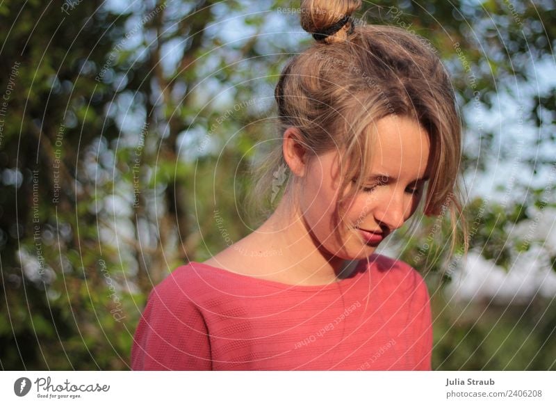 woman beautiful red blond nature Sunlight Beautiful weather Foliage plant Garden T-shirt Blonde Bangs Braids Sadness Disappointment Concentrate Colour photo