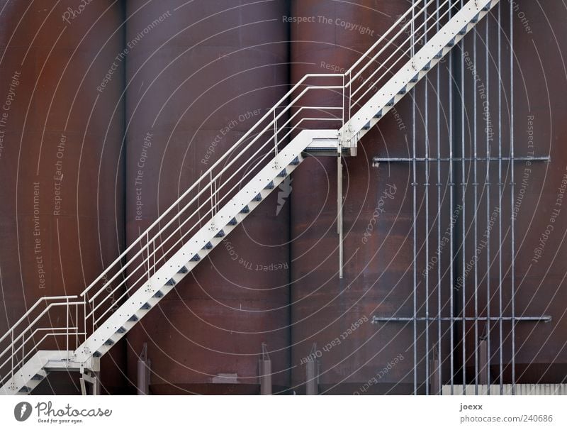 chocolate factory Industrial plant Stairs Metal Steel Old Large Above Multicoloured White Silo steel staircase Banister Steep Rust Colour photo Exterior shot