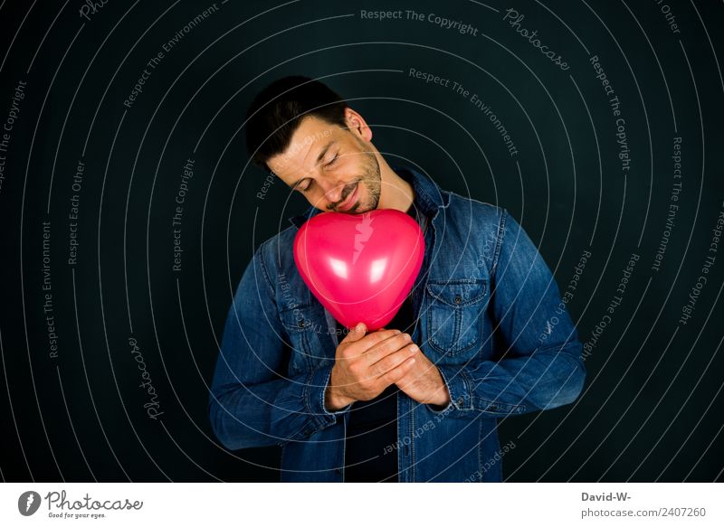 a man in love, dreaming, holding a heart-shaped balloon in his hands Man Balloon Heart-shaped Love Romance romantic Infatuation In love Emotions Colour photo