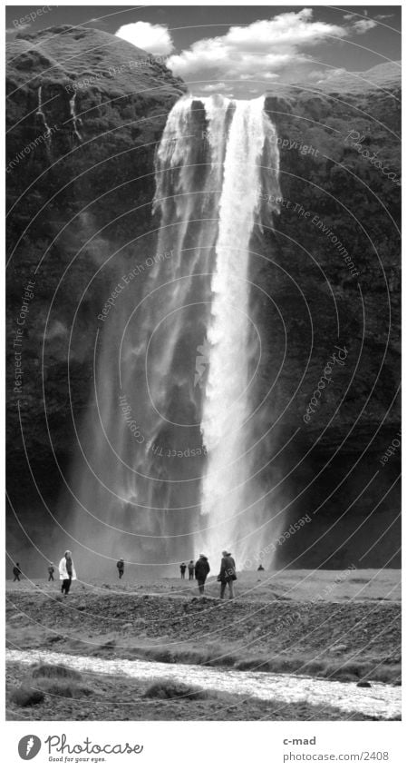 Waterfall in the south of Iceland Clouds Hot High plain Moody Mountain Black & white photo Human being