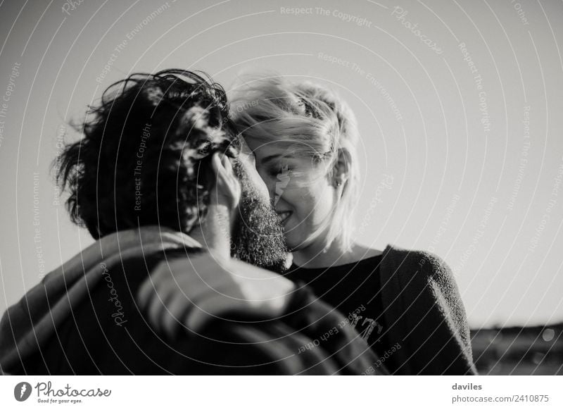 Black and white portrait of couple kissing outdoors. Joy Sun Human being Woman Adults Man Family & Relations Couple Partner 2 18 - 30 years Youth (Young adults)