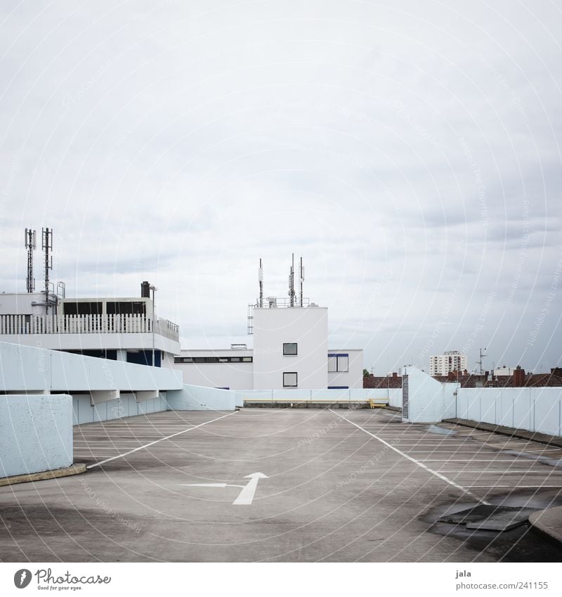 multi-storey car park Sky Clouds House (Residential Structure) Places Manmade structures Building Architecture Roof Gloomy Town Blue Gray White Parking lot