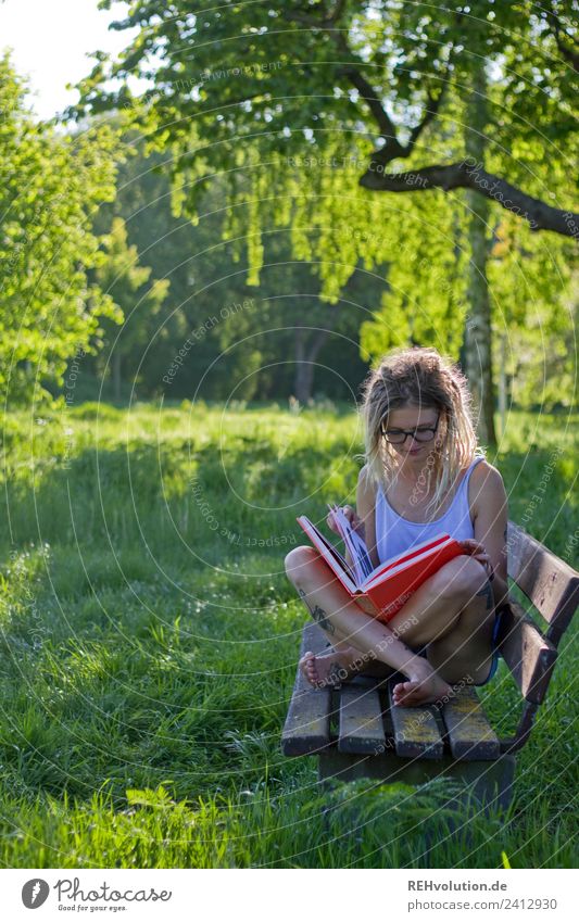 Jule Young woman with dreads reads in the country Lifestyle Style Joy Happy Well-being Contentment Relaxation Calm Leisure and hobbies Vacation & Travel