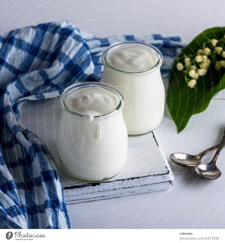 jars with homemade yogurt Yoghurt Nutrition Breakfast Diet Spoon Table Flower Wood Fresh Blue White Greek glass food healthy Napkin background Meal eat