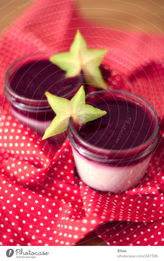 Yoghurt fruit dessert with star fruit as decoration in preserving jars Fruit Candy Delicious Skimmed milk Berries Carambole Point Fresh Dessert Cold Studio shot