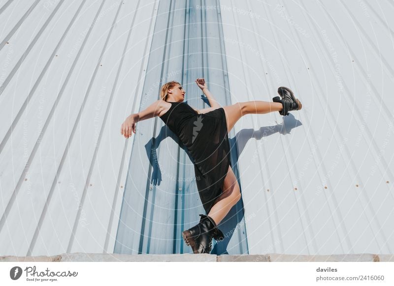 White blonde woman posing with black dress, raising up the leg. Lifestyle Dance Young woman Youth (Young adults) Woman Adults 1 Human being 18 - 30 years Artist