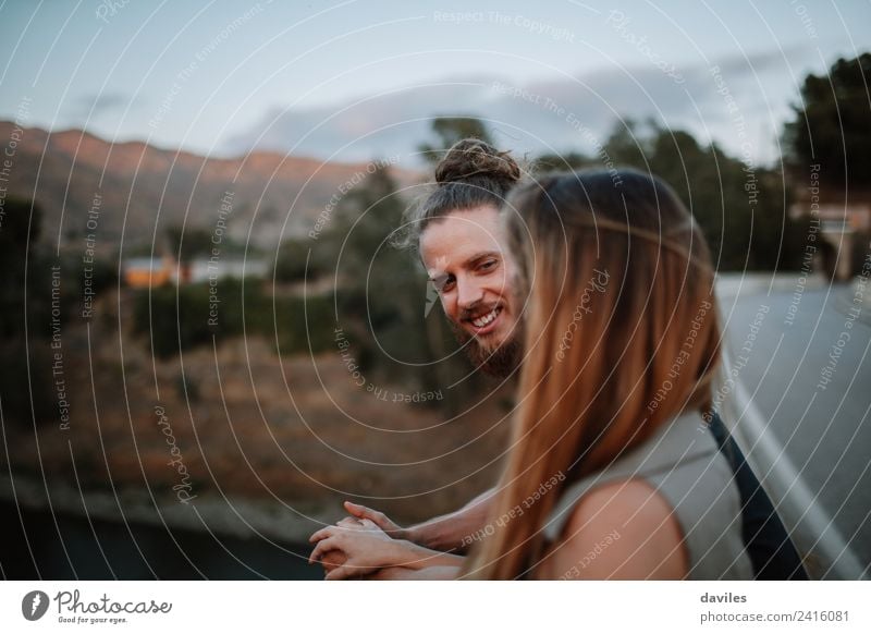 Bearded man smiling with his girlfriend. Lifestyle Joy Beautiful Summer Human being Woman Adults Man Couple 2 18 - 30 years Youth (Young adults) Nature Forest