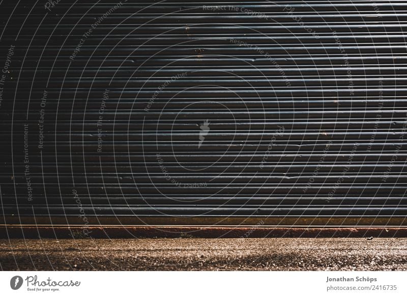 Garage door at night Town Outskirts Aggression Old Poverty Hideous Brighton Night England Industry Industrial Structures and shapes Minimalistic Free space