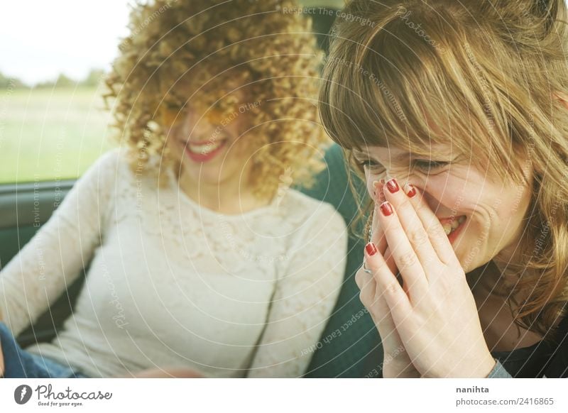 Two young women having fun together Lifestyle Style Joy Beautiful Hair and hairstyles Wellness Vacation & Travel Trip Human being Feminine Young woman