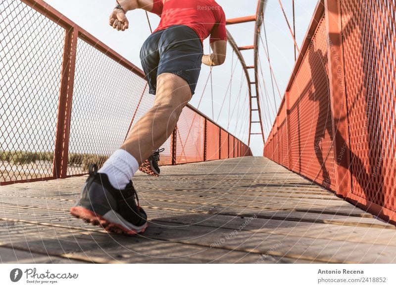 Runner on bridge Sports Jogging Human being Man Adults 1 Bridge Pedestrian Railroad Fitness Athletic Red running sprint workout training sportsman spanish