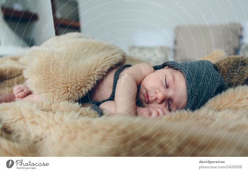 Baby girl with pompom hat sleeping Beautiful Calm Bedroom Child Human being Woman Adults Feet Warmth Hat Sleep Authentic Small Naked Cute Comfortable Ease