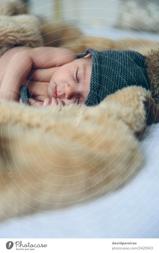 Newborn baby with pompom hat sleeping on blanket Beautiful Calm Bedroom Child Human being Baby Woman Adults Warmth Hat Sleep Authentic Small Naked Cute