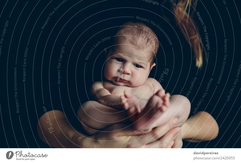 Nude baby posing in her mother's arms Lifestyle Beautiful Living room Child Human being Baby Woman Adults Mother Family & Relations Feet Love Carrying Embrace