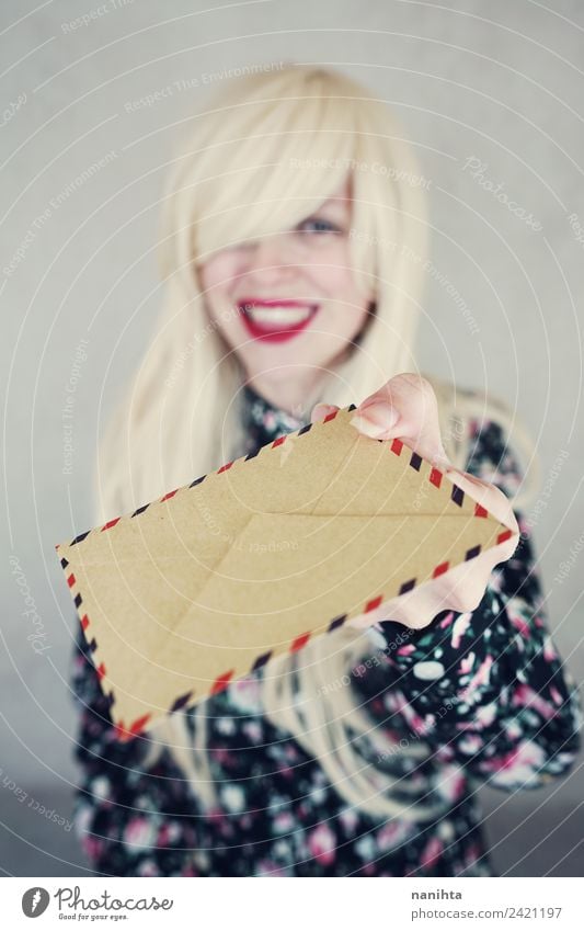 Young happy woman holding an envelope Design Hair and hairstyles Wellness Work and employment Mail To talk Human being Feminine Young woman Youth (Young adults)