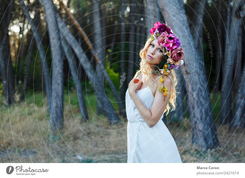 Beauty woman with romantic white dress and flowers in forest Attractive Back-light Beautiful Blonde Blue Bride Rural Calm Caucasian Elegant Fashion Woman Flower