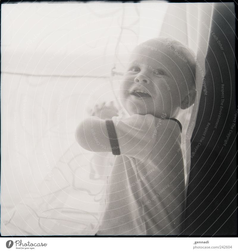 Happy, Happy Human being Masculine Child Boy (child) Face 1 0 - 12 months Baby T-shirt Smiling Playing Toddler Curtain Joy Happiness Honest Black & white photo