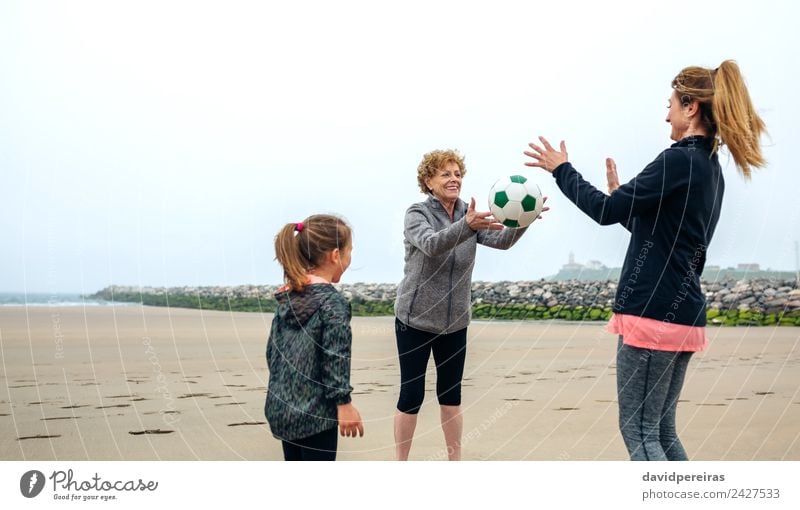 Three generations female playing on the beach Lifestyle Joy Happy Playing Beach Child Retirement Human being Woman Adults Mother Grandmother Family & Relations